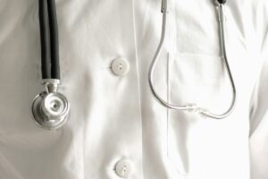 Close up of stethoscope and lab coat